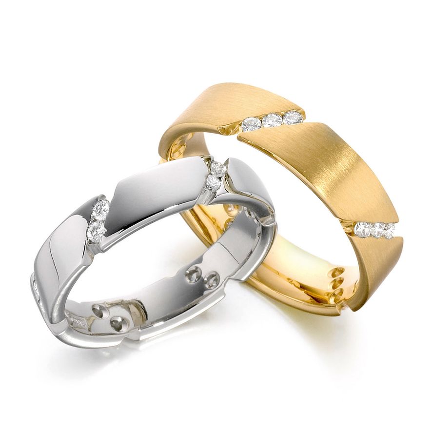 Обручальные кольца из белого и жёлтого золота с бриллиантами