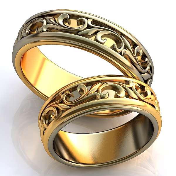 Обручальные кольца из белого и желтого золота с узорами - фото 998089 Ювелирная студия Dolce vita