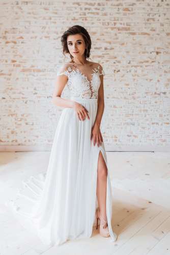 Свадебное платье: 1713
Дизайнеры: Татьяна Ковальчук и Ирина Довгань - фото 15588580 Невеста01